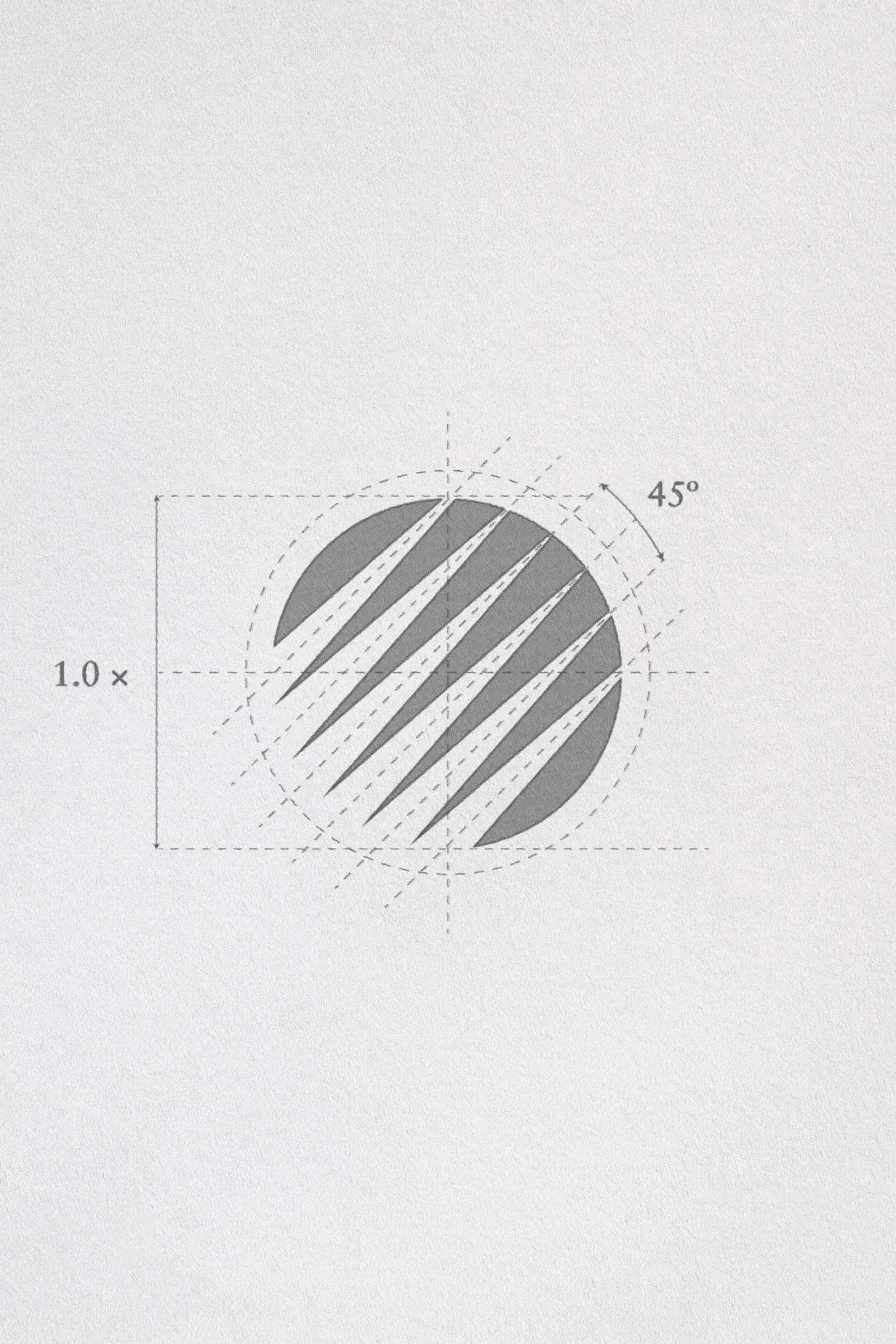 Construction drawing of the Deva symbol, a circle divided by seven diagonal strokes at 45º, with dashed guides and a 1.0× height reference.